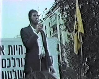   הרב בנימין כהנא היד נואם בעצרת עם בשנת תשנ(1) 00:04:38